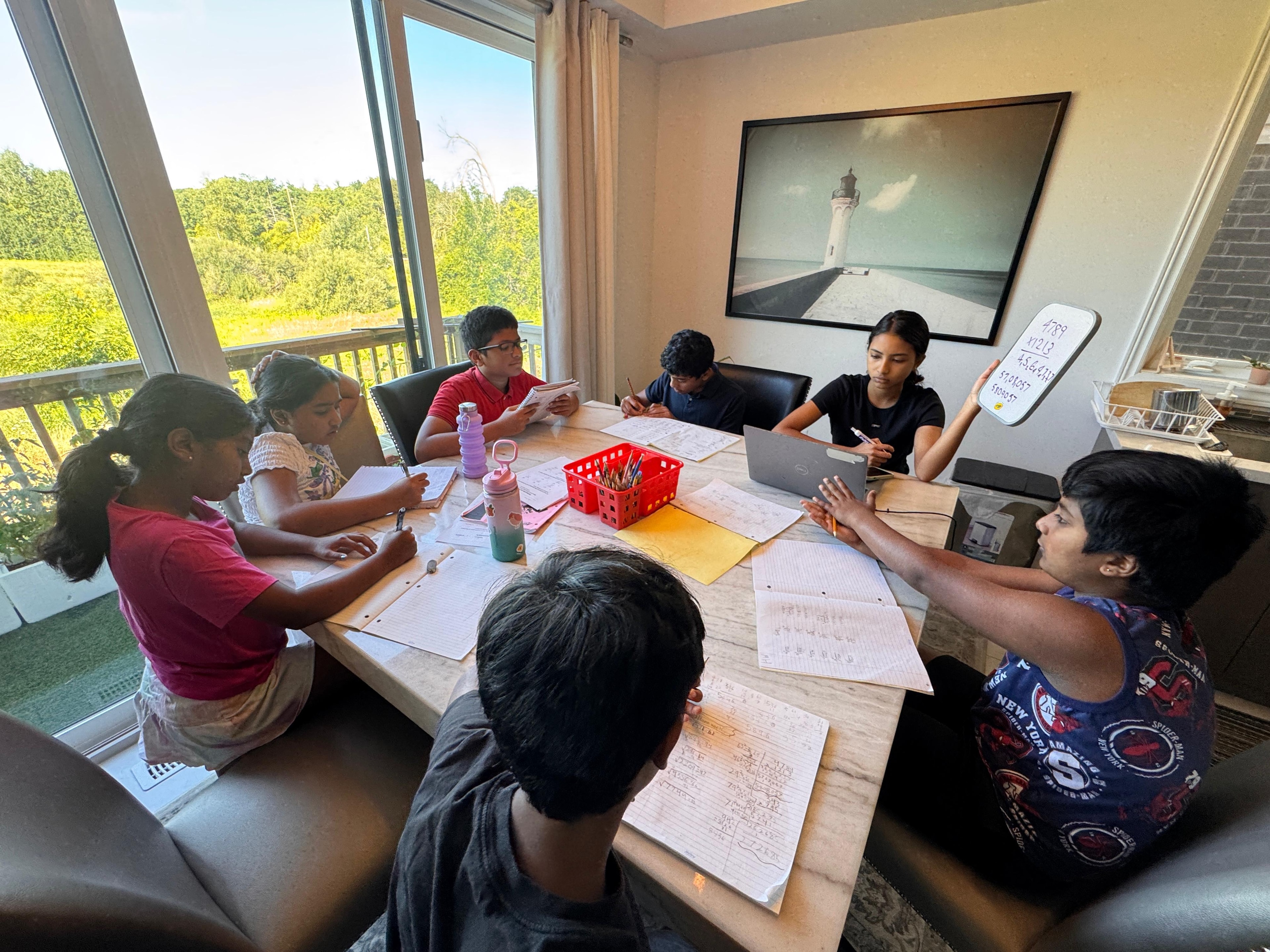 Students focused on worksheets during the August 2026 Skillfinity camp