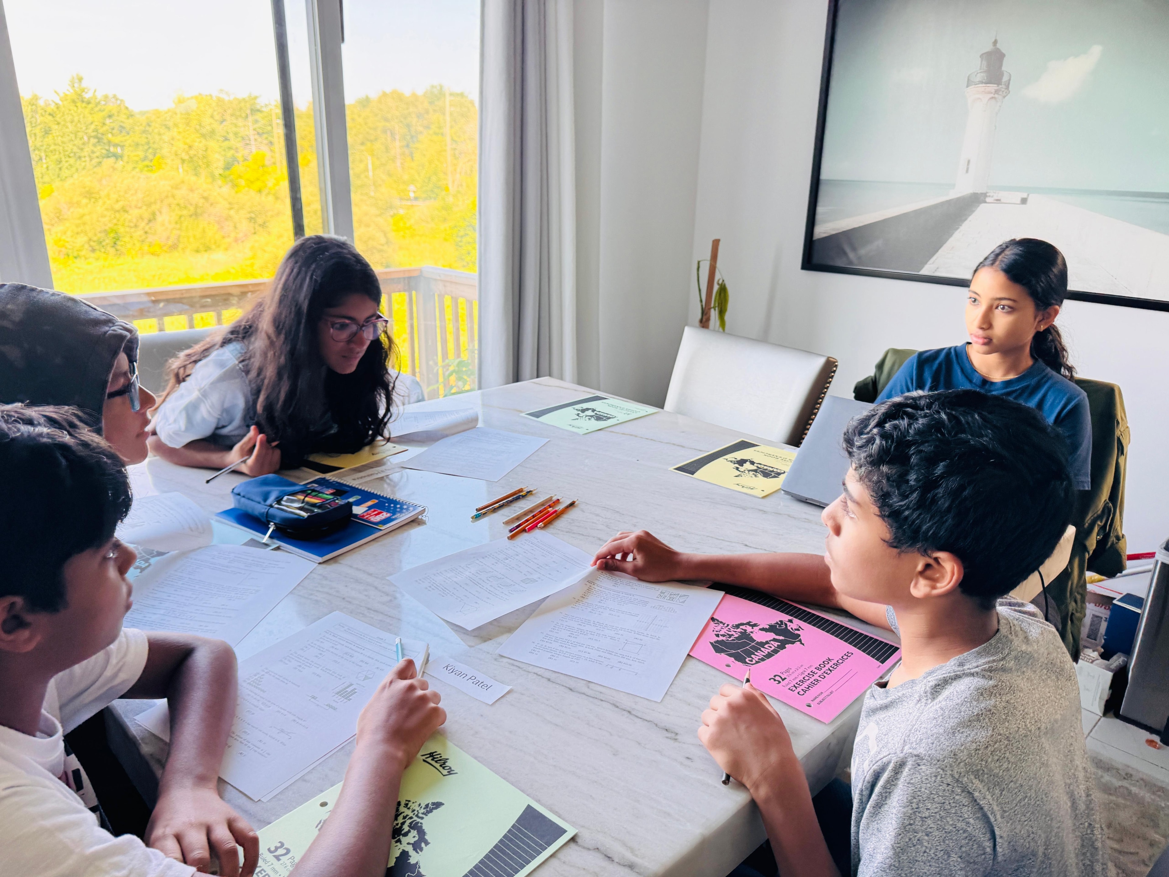 Students working through contest prep problems with Disha instructing