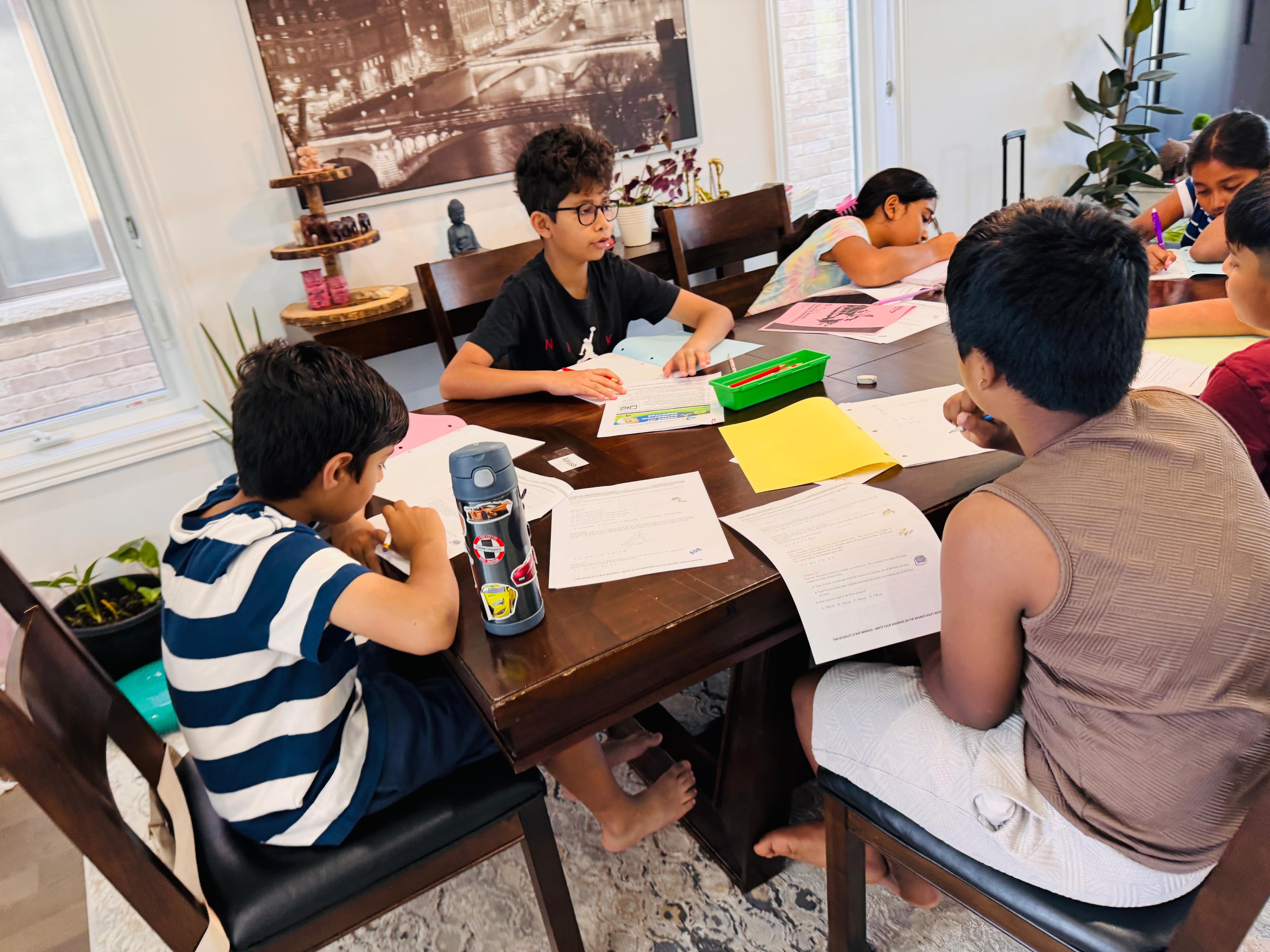 Students focused on their worksheets during a Skillfinity session